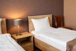 Katil atau katil-katil dalam bilik di Hotel Almi