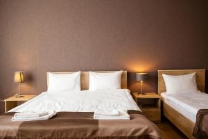 Katil atau katil-katil dalam bilik di Hotel Almi