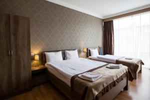 Katil atau katil-katil dalam bilik di Hotel Almi