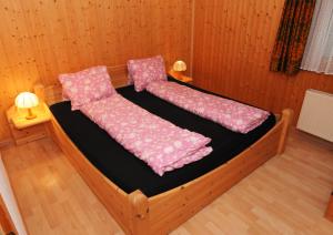 Postel nebo postele na pokoji v ubytování Chalet Barbara