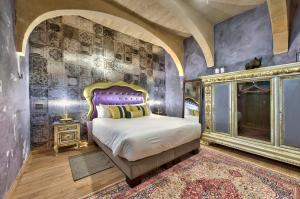 Postel nebo postele na pokoji v ubytování Palazzo Consiglia - IK Collection