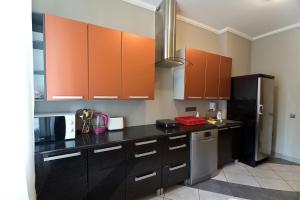 Kuchyň nebo kuchyňský kout v ubytování Happy Hotel