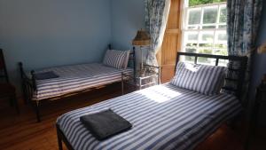 Krevet ili kreveti u jedinici u objektu Knockaderry House
