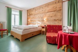 Łóżko lub łóżka w pokoju w obiekcie Hotel Oasi