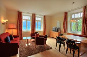 Posedenie v ubytovaní Romantik Residenz (Ferienwohnungen Hotel Im Weissen Rössl) - Dependance