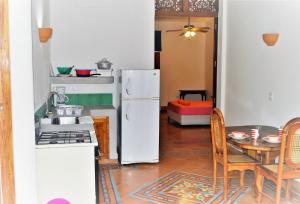 Virtuvė arba virtuvėlė apgyvendinimo įstaigoje Casa Calala
