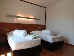 Postel nebo postele na pokoji v ubytování Al Marinaio Hotel Garni