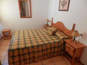 Postel nebo postele na pokoji v ubytování Apartamentos Martin