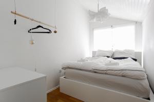 Ein Bett oder Betten in einem Zimmer der Unterkunft the Mulang House