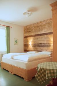 Łóżko lub łóżka w pokoju w obiekcie Hotel Oasi