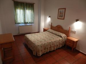 Postel nebo postele na pokoji v ubytování Apartamentos Martin
