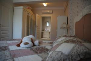 Ein Bett oder Betten in einem Zimmer der Unterkunft Damla Pansiyon