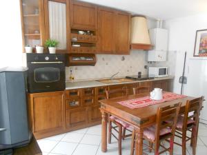 Кухня или кухненски бокс в Casa Fattorini