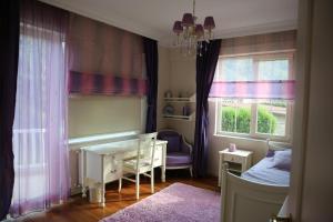Ein Bett oder Betten in einem Zimmer der Unterkunft Damla Pansiyon