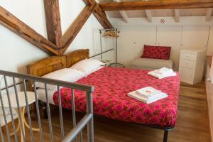 Un pat sau paturi într-o cameră la La Sciora Oliva