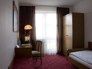 Postel nebo postele na pokoji v ubytování Hotel Alina