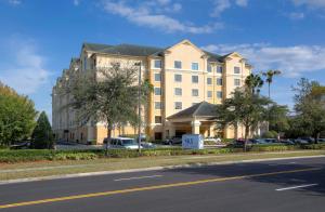 a large building on the side of a street at staySky Suites I-Drive Orlando Near Universal in Orlando