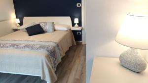 una stanza d'albergo con un letto e una lampada di B&B Micucco a Milazzo