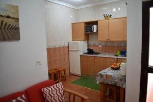 Kuchyň nebo kuchyňský kout v ubytování Apartamentos Flor del Cotillo