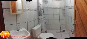 Koupelna v ubytování Residencial Sibaúma