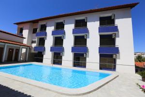 Bazén v ubytování Hotel Porto do Sol nebo v jeho okolí