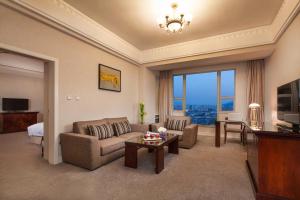 TV a/nebo společenská místnost v ubytování Overseas Chinese Hotel Wenzhou