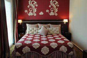 Postel nebo postele na pokoji v ubytování Dream's Hotel