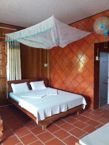 Ένα ή περισσότερα κρεβάτια σε δωμάτιο στο Ba Linh Homestay