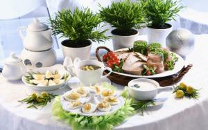 a table with a plate of food on a table with plants at New Vilard in Tissamaharama +55 photos
