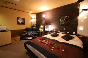 Кровать или кровати в номере Restay Penthouse (Adult Only)