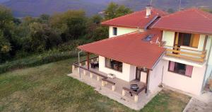 an overhead view of a house with a red roof at Guest House Villa Bozhenitsa in Bozhenitsa
