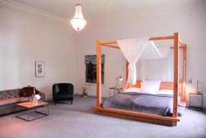 Voodi või voodid majutusasutuse Romantik Hotel Schloss Reichenow toas
