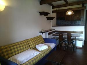 Ένα ή περισσότερα κρεβάτια σε δωμάτιο στο Apartment 4 Residence Palace 2