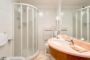 Ett badrum på Hotel Dolomiti