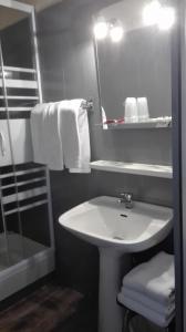 Koupelna v ubytování Hotel Valérie