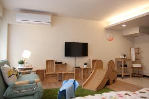 TV a/nebo společenská místnost v ubytování Ho.Me-Easyhouse + 33 fotografií