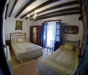 Lova arba lovos apgyvendinimo įstaigoje Casa Rural Bracamonte