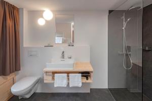Kylpyhuone majoituspaikassa Hotel Breithorn