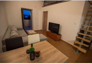 Ein Sitzbereich in der Unterkunft Apartments Punta