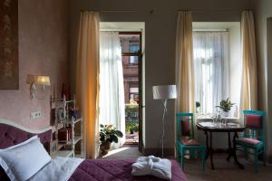 Postel nebo postele na pokoji v ubytování Hotel 19