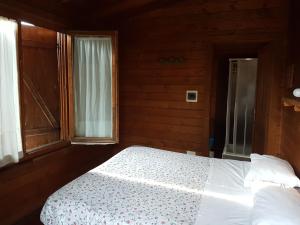 Postel nebo postele na pokoji v ubytování Agriturismo Cisogna