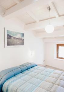 En eller flere senge i et værelse på La Palummara