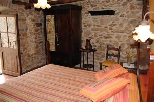 Postel nebo postele na pokoji v ubytování Apartaments turistics Moli Can Coll