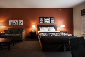 Postelja oz. postelje v sobi nastanitve Sleep Inn & Suites Hennessey North