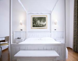 Postel nebo postele na pokoji v ubytování Hotel Sebino