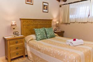 Un pat sau paturi într-o cameră la Casa La Plaza