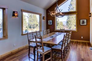 a dining room with a wooden table and chairs at Stockholm Luxury Retreat in Truckee