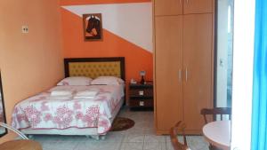 A bed or beds in a room at Pousada e Restaurante O Nativo