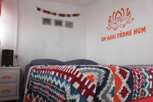 Postel nebo postele na pokoji v ubytování Hostal La Isla