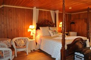 Voodi või voodid majutusasutuse Auberge sur la Côte toas